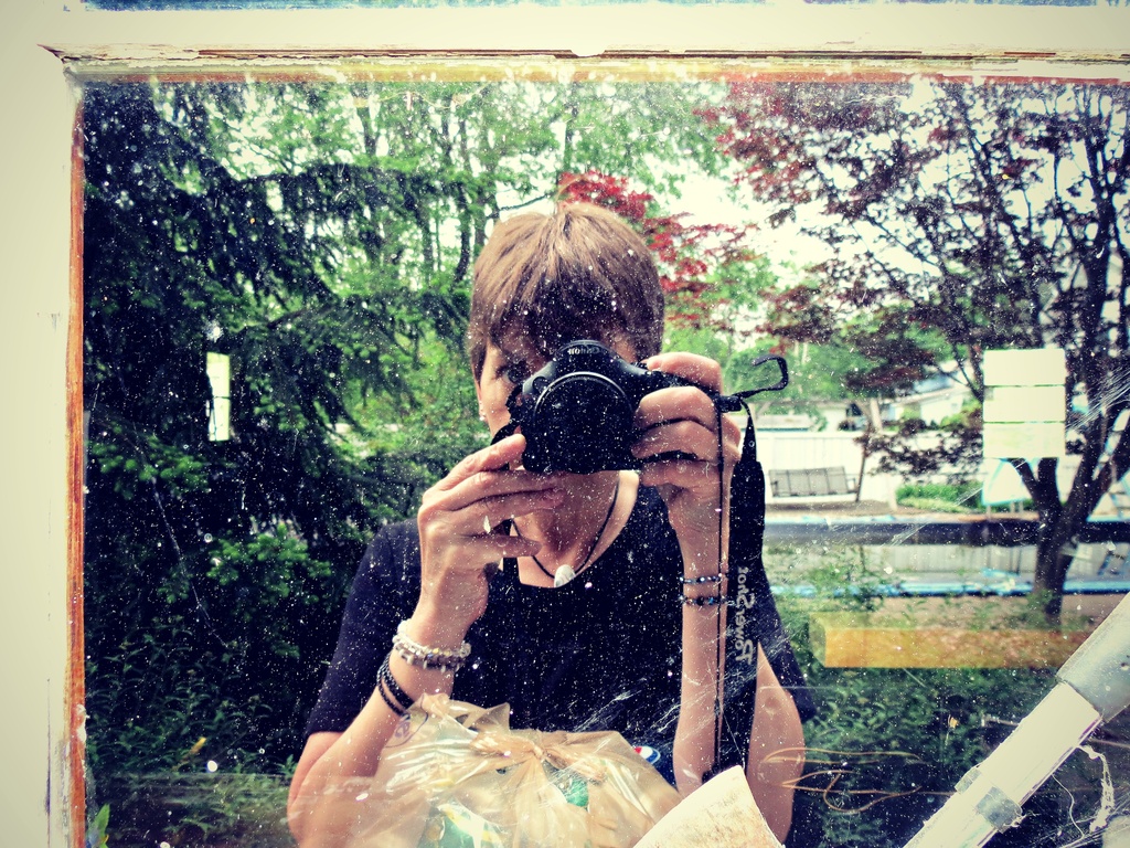 Selfie in a Dirty Window by juliedduncan