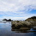 Bandon Rocks with Blue Sky  by jgpittenger