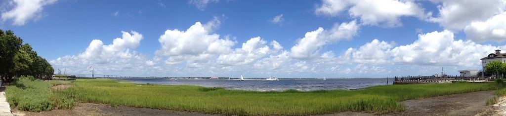 Charleston Harbor from Waterfront Park on a cloud-filled summer afternoon. by congaree