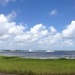 Charleston Harbor from Waterfront Park on a cloud-filled summer afternoon. by congaree