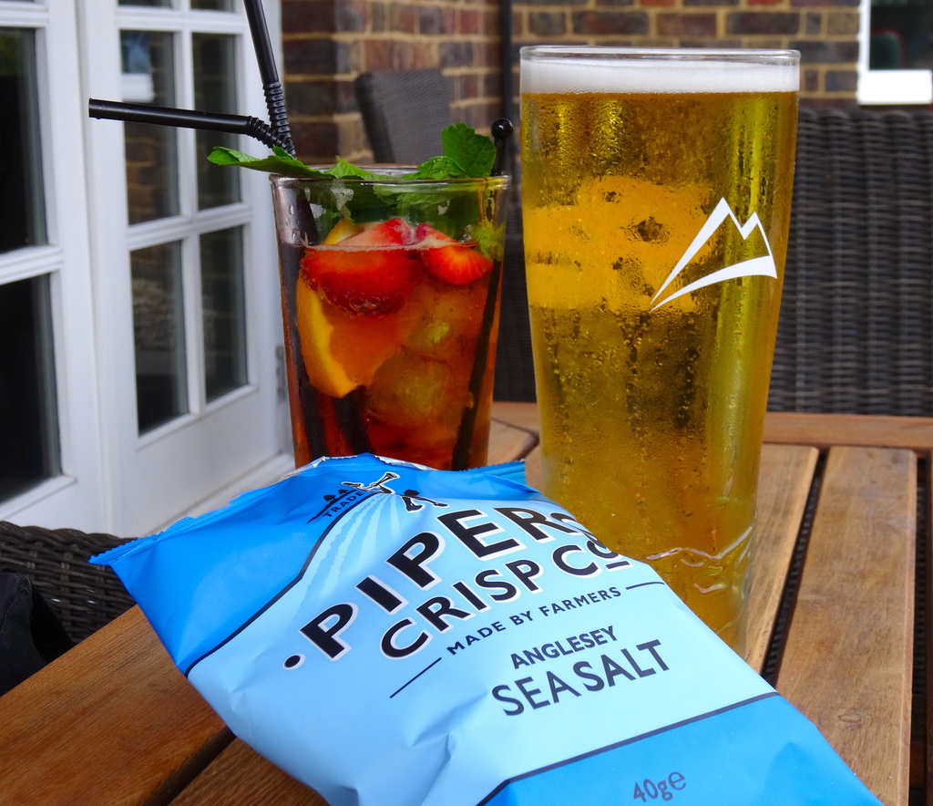 Crisps, Pims and a beer-yep sunshine drinks by padlock