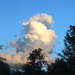 Towering cloud by padlock