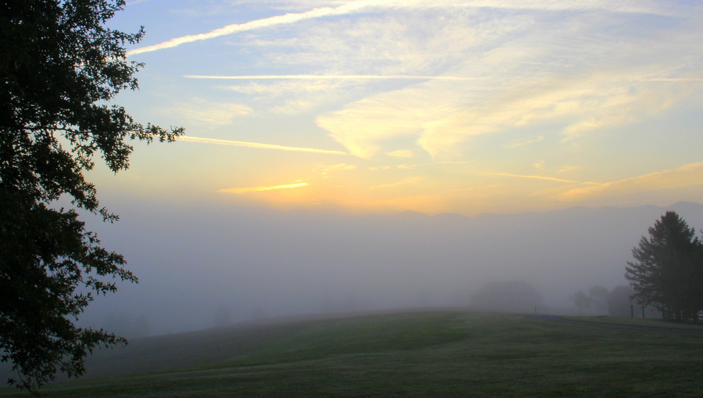 Sun Rising Above The Fog by calm