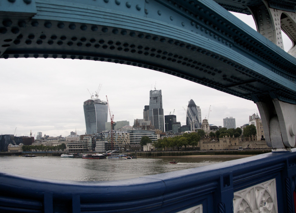 The City through Tower Bridge by nicolaeastwood