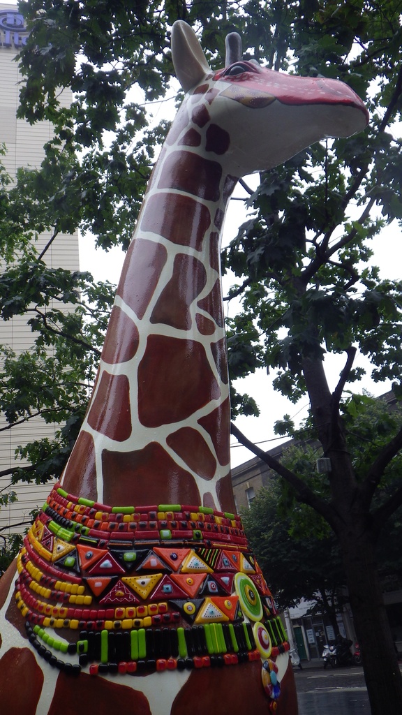 Giraffes around More London by bizziebeeme