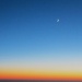 Moon, Star, Sunset from a Dirty Plane Window by jyokota