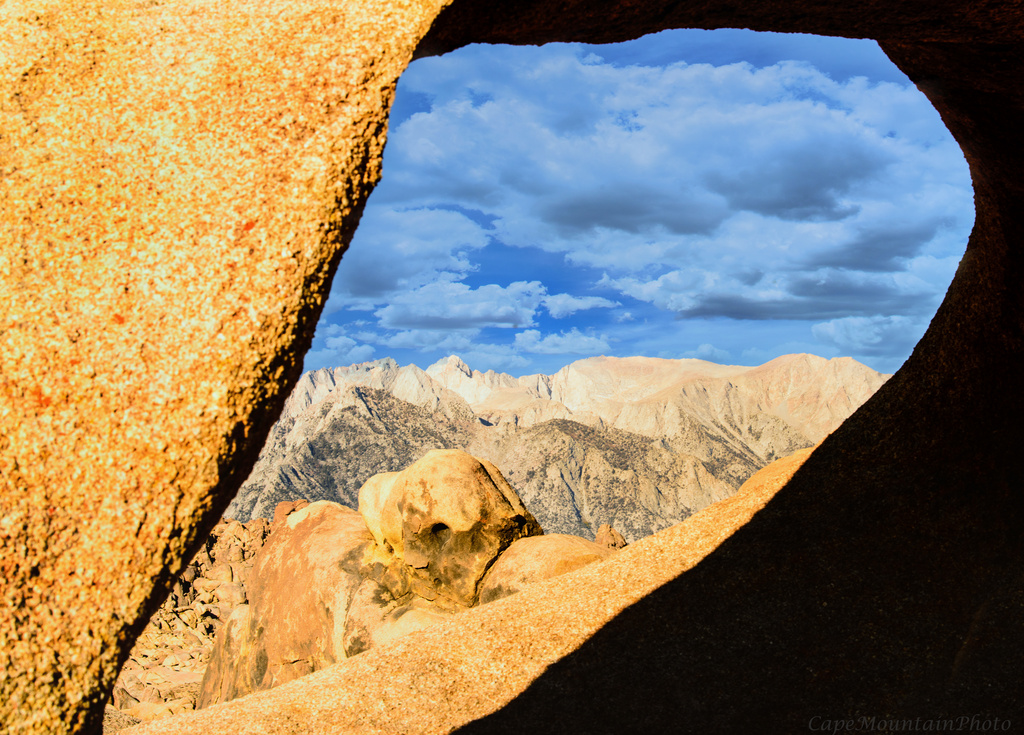 Mountains Through Arch by jgpittenger