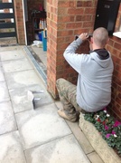 18th Oct 2013 - Bob the builder's son installing a new letter box