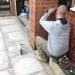 Bob the builder's son installing a new letter box by foxes37