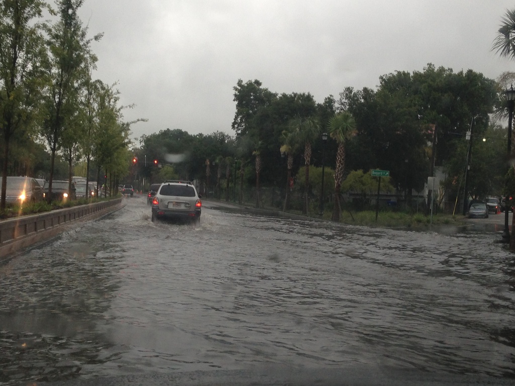 Flooded street in Charleston, SC by graceratliff