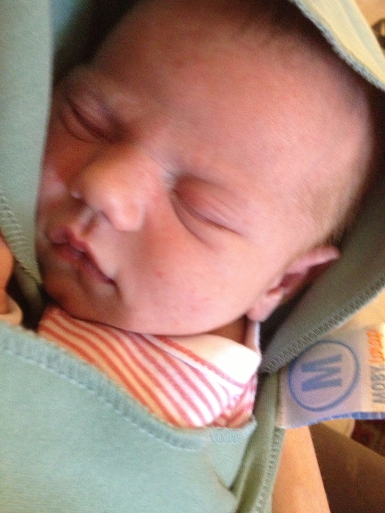 Snuggled up in her wrap for the first time.  by doelgerl