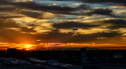 7th Oct 2013 - Airplane Flying Out of the Sunrise