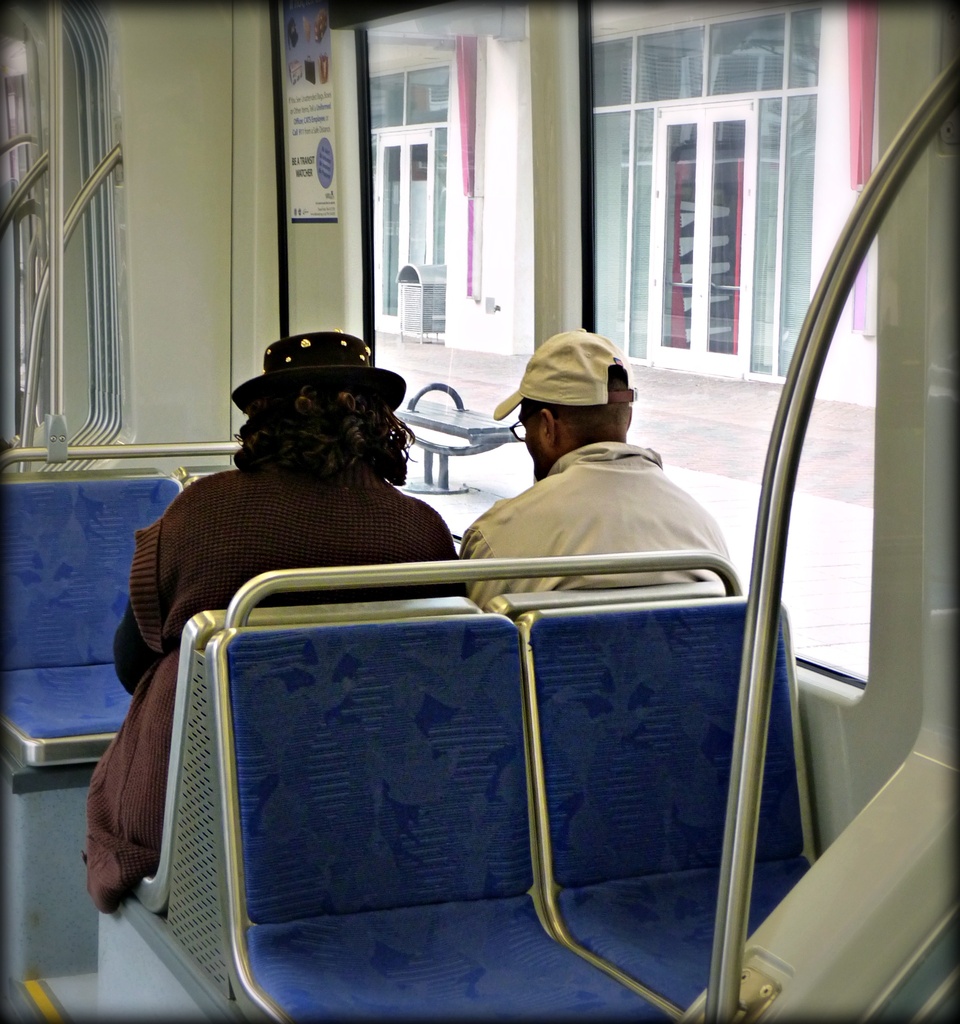 Couple on the Train by peggysirk