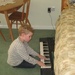 Like father like son!  Another pianist in the making. by foxes37