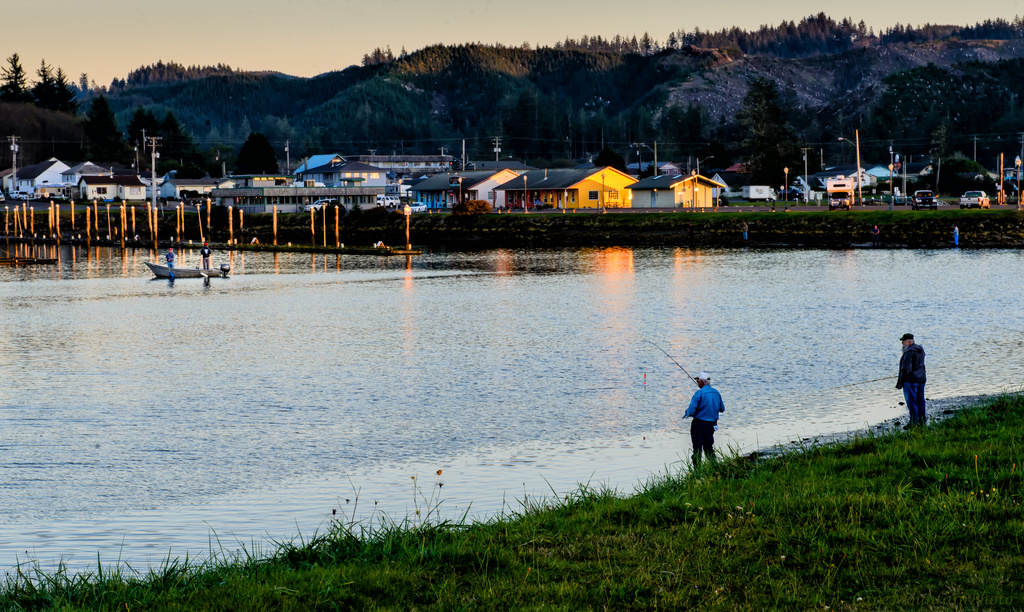Fishing At the Golden Hour In Winchester Bay  by jgpittenger