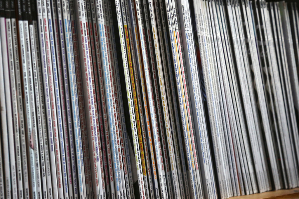 Spines of a number of my guitar magazines by padlock