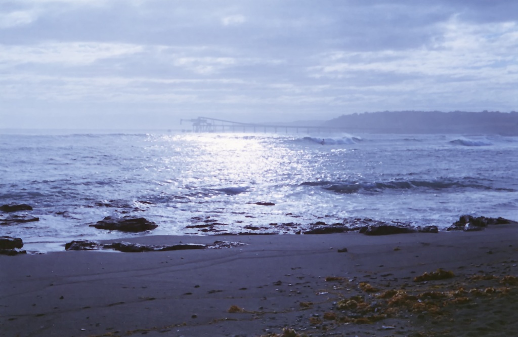 Light, waves and surfer by peterdegraaff