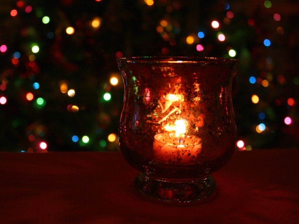 Warm candle with bokeh by mittens