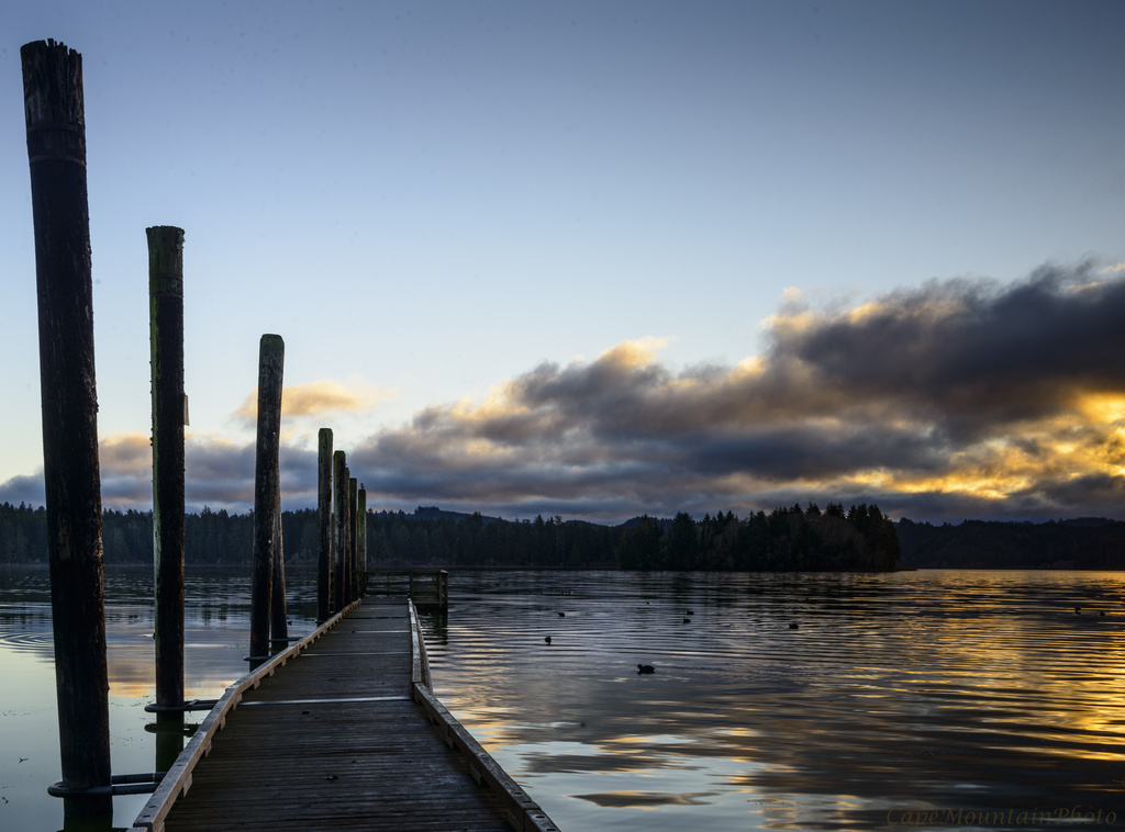 Sunrise At Siltcoos Pier  by jgpittenger