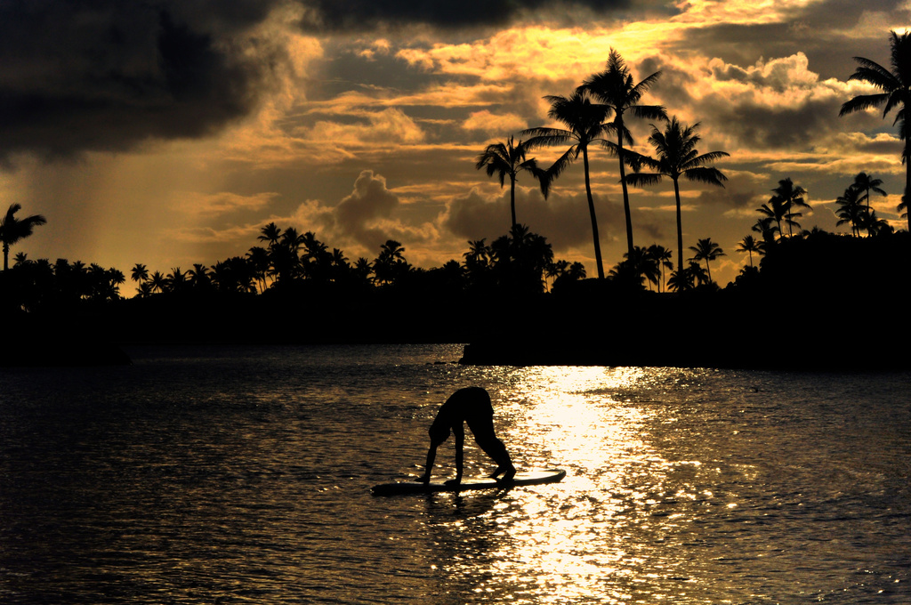Surfboard Yoga at Sunset on Oahu by taffy