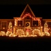Pretty house with lights by mittens