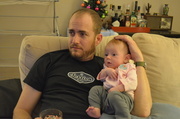 29th Dec 2013 - Dad is teaching her to watch sports.