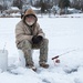 Old school ice fishing...who needs an ice shanty by dridsdale