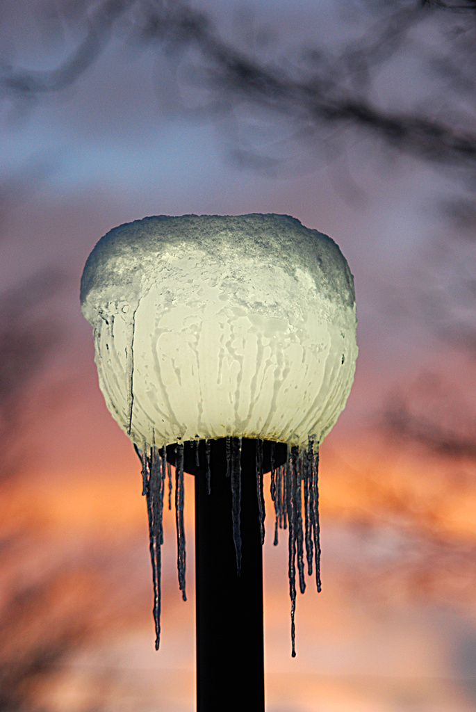 Lamp post with icicles at sunset! by fayefaye