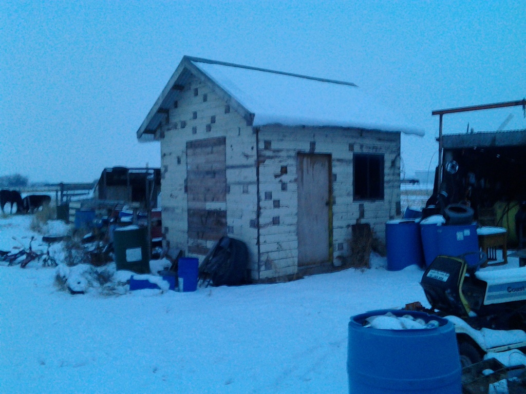 shed with fresh snow overhang by clemm17