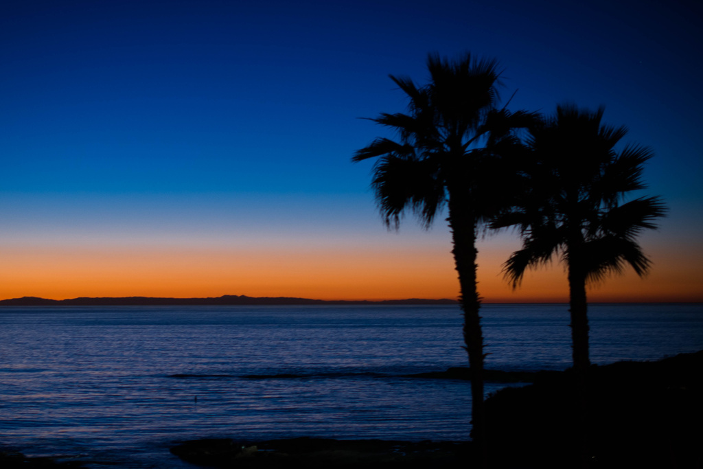 Sunset Silhouette at Laguna Beach by stray_shooter