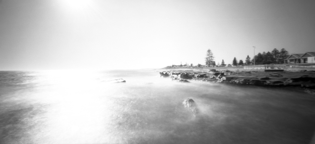 Ocean and rocks near the pool by peterdegraaff