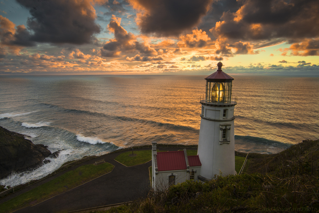 Horizontal Lighthouse At Sunset by jgpittenger