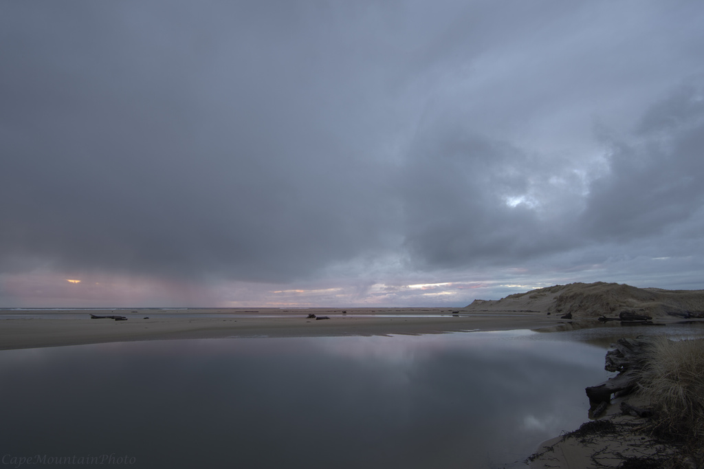 Cloudy Sunset Looking North At Siltcoos Outlet by jgpittenger