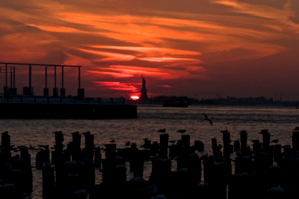 Statue of Liberty at Sunset by jyokota