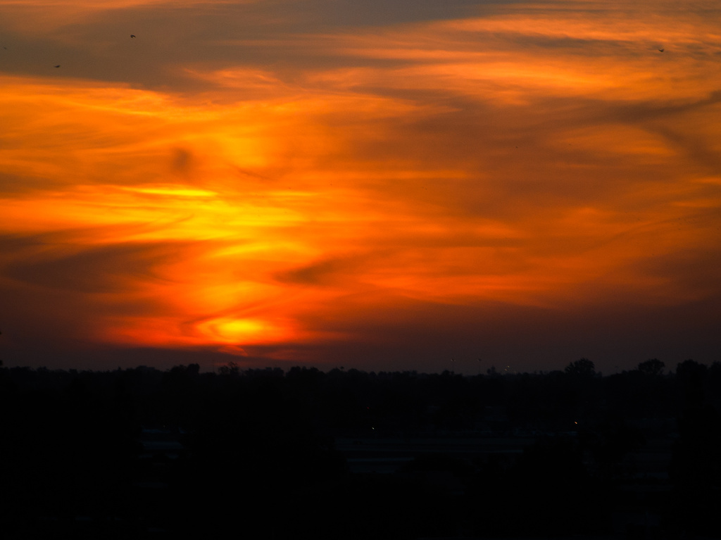 Firey Wispy Sunset by stray_shooter