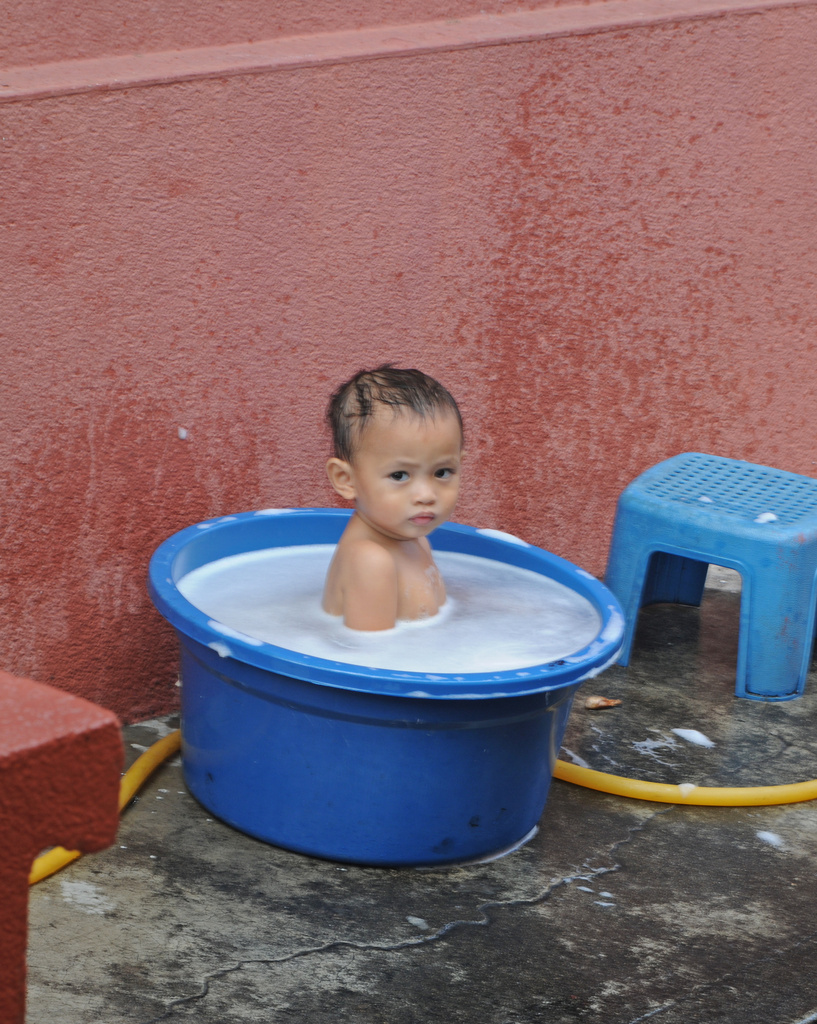 Bath time on the street Melaka by ianjb21