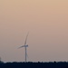 Windmill with sunset behind it. by motorsports