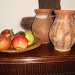 Apples and cider jugs .  by snowy