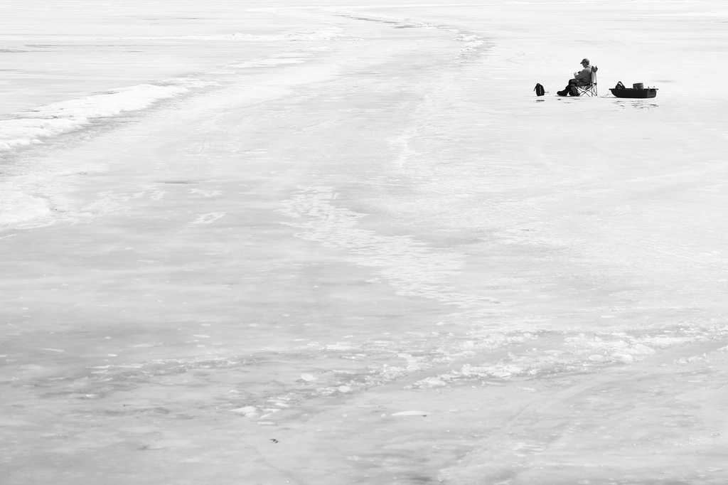 Enjoying the sun on the frozen lake by tosee