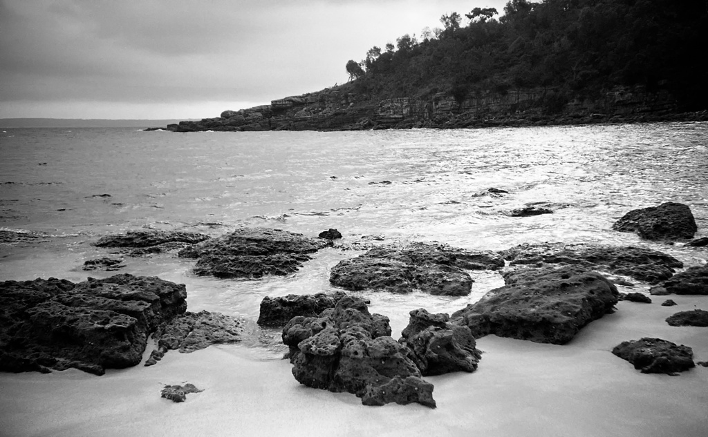 Rocks at Silica Cove by peterdegraaff