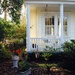 Charleston porch an geraniums by congaree