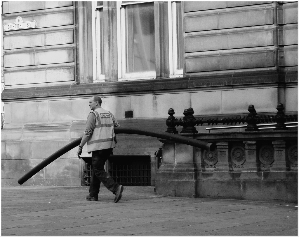 Man With A Bendy Tube On Burton Street by phil_howcroft