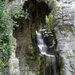 Paris - Waterfall in Parc des Buttes Chaumont by fishers