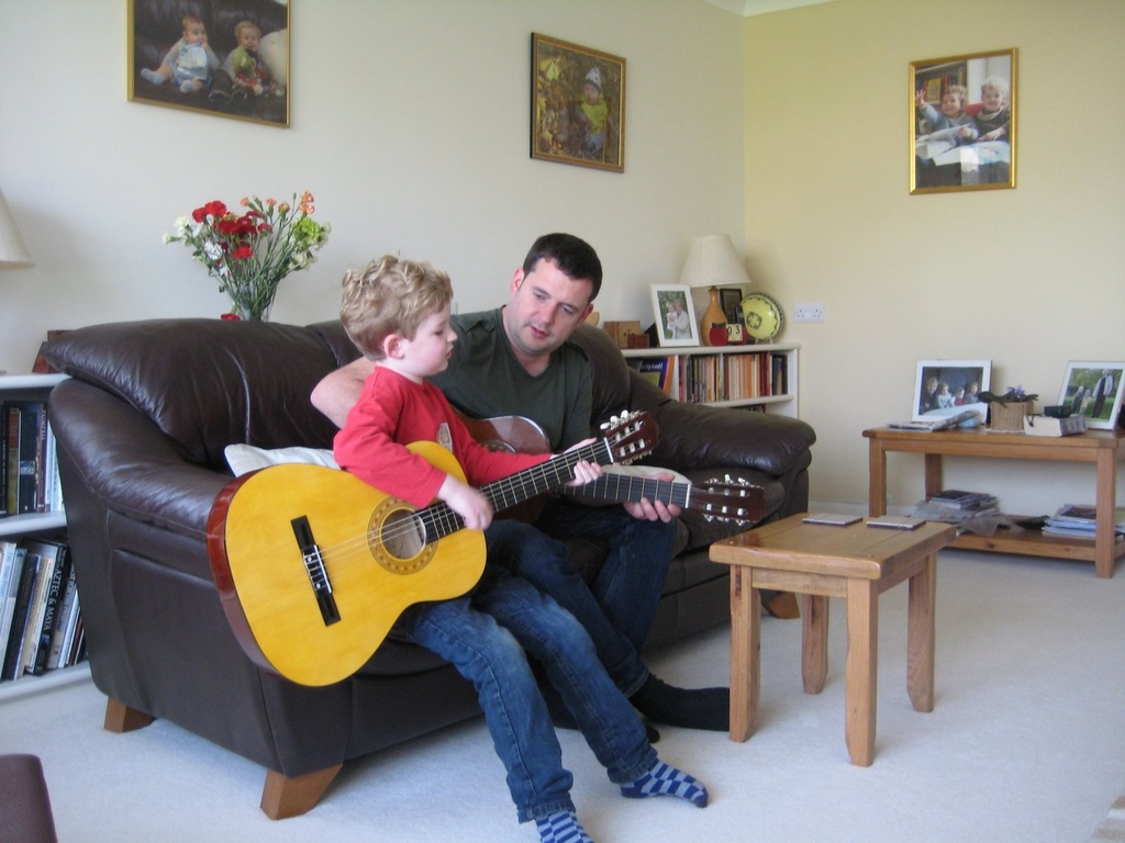 Son and grandson having a jam by foxes37