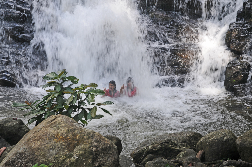 Children enjoying waterfall by ianjb21