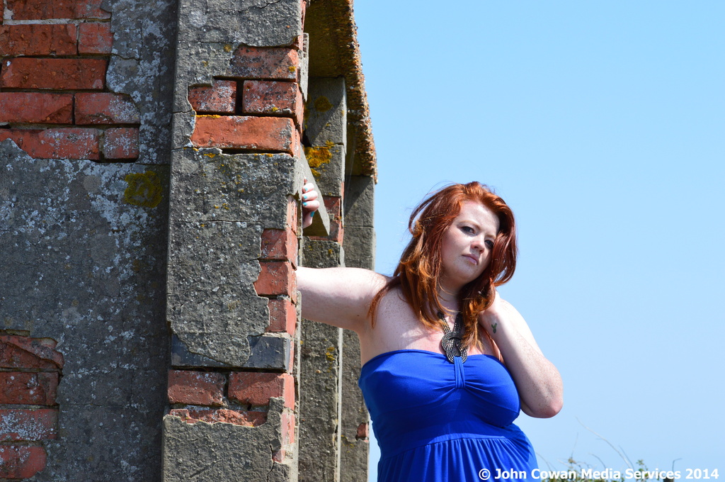 Red Head, Red Brick and a Blue Dress by motorsports