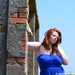 Red Head, Red Brick and a Blue Dress by motorsports