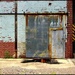 Rusty Door and Painted Bricks by olivetreeann