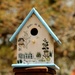 Blue and white birdhouse by judyc57