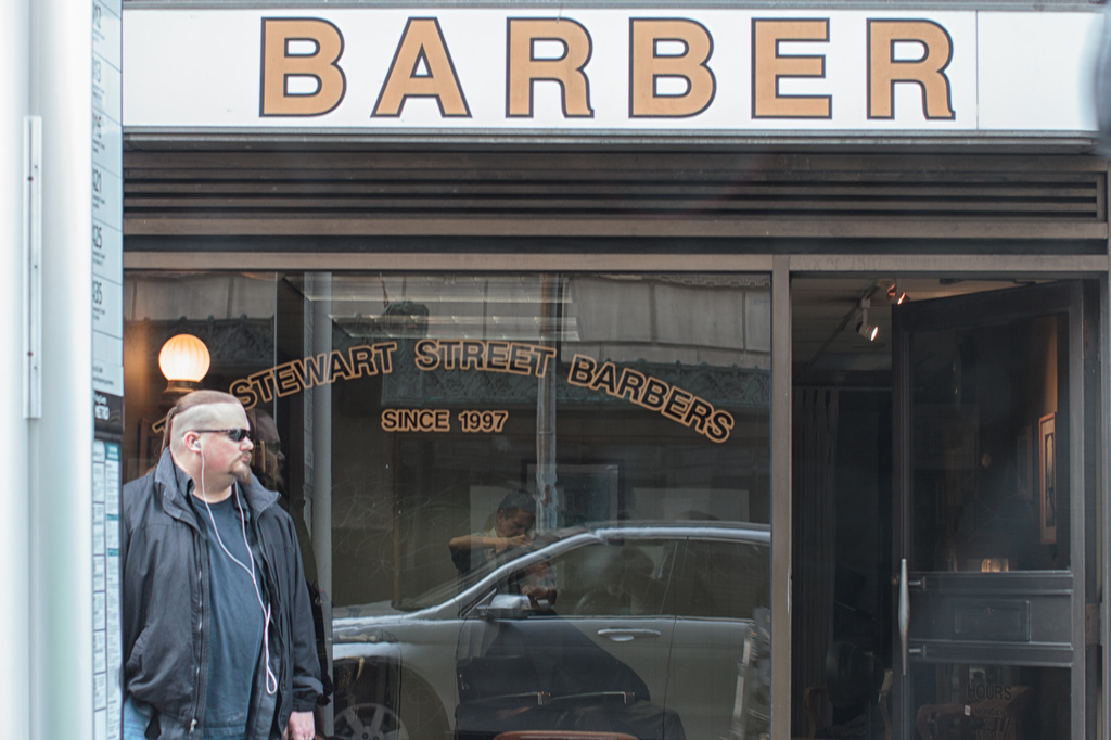 He Was Waiting For The Bus...Was This The Creation Of Stewart Street Barbers... by seattle